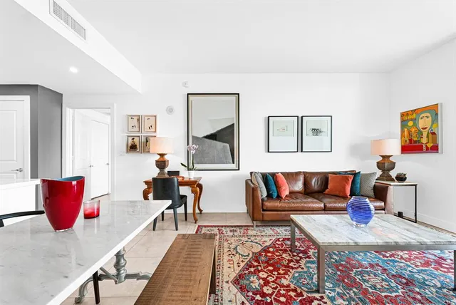 a living room with furniture and a couch