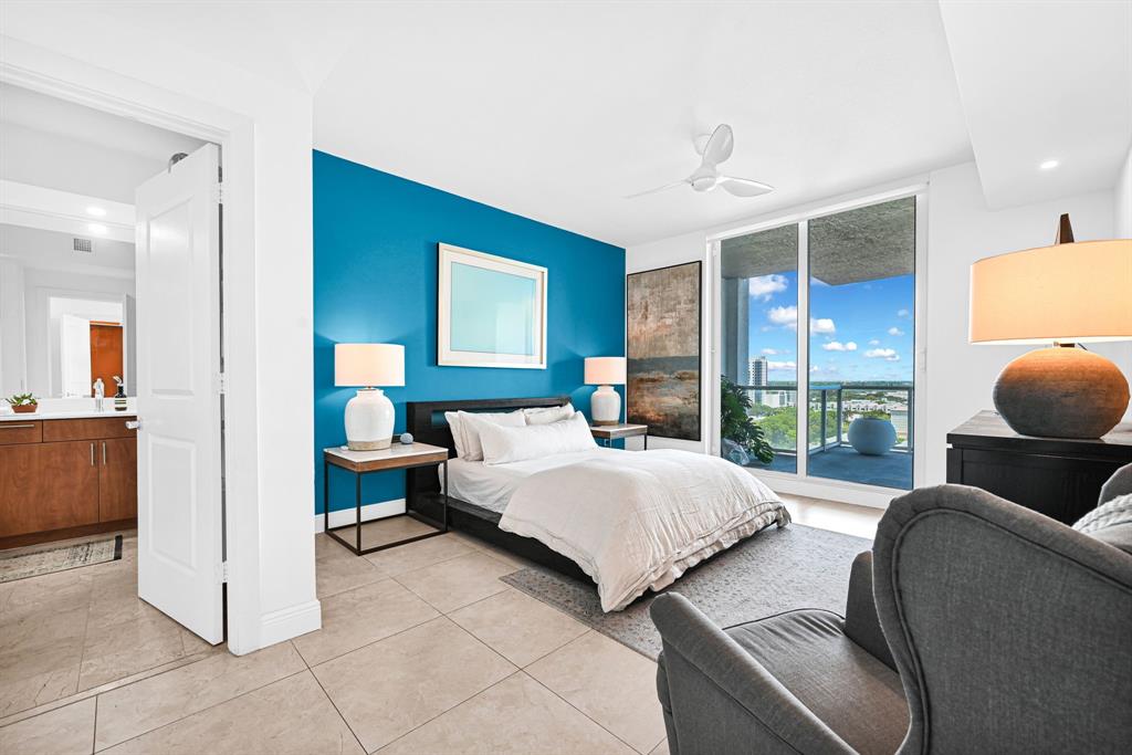 315 Northeast 3rd Avenue, Unit 1008 Fort Lauderdale, FL 33301 - Photo 17 of 52 a bedroom with a bed and large window