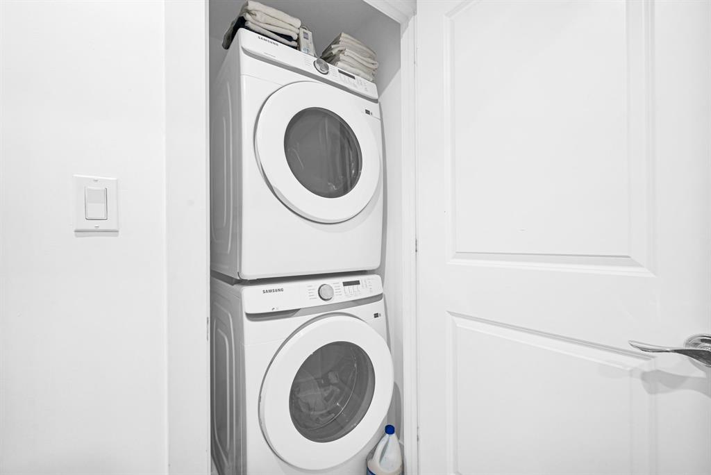 315 Northeast 3rd Avenue, Unit 1008 Fort Lauderdale, FL 33301 - Photo 28 of 52 a utility room with dryer and washer