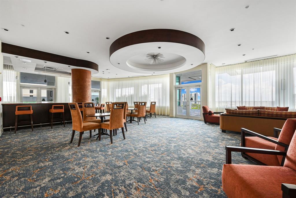 315 Northeast 3rd Avenue, Unit 1008 Fort Lauderdale, FL 33301 - Photo 42 of 52 a living room with furniture and a large window
