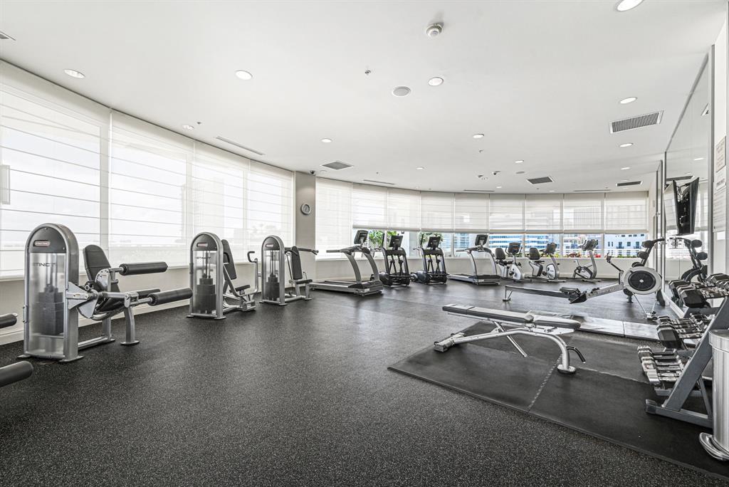 315 Northeast 3rd Avenue, Unit 1008 Fort Lauderdale, FL 33301 - Photo 44 of 52 a view of a room with gym equipment