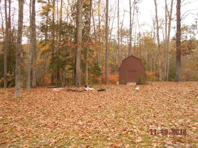580 Manchester Road Mount Gilead, NC 27306 - Photo 13 of 13 a view of wooden fence and trees