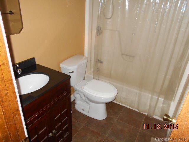 580 Manchester Road Mount Gilead, NC 27306 - Photo 5 of 13 a bathroom with a sink and a toilet