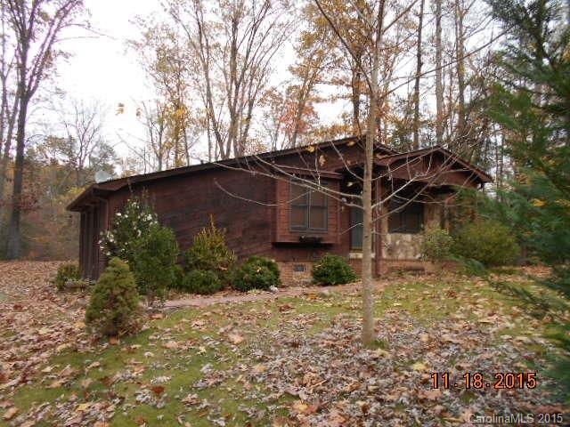 580 Manchester Road Mount Gilead, NC 27306 - Photo 9 of 13 a view of a house with a yard