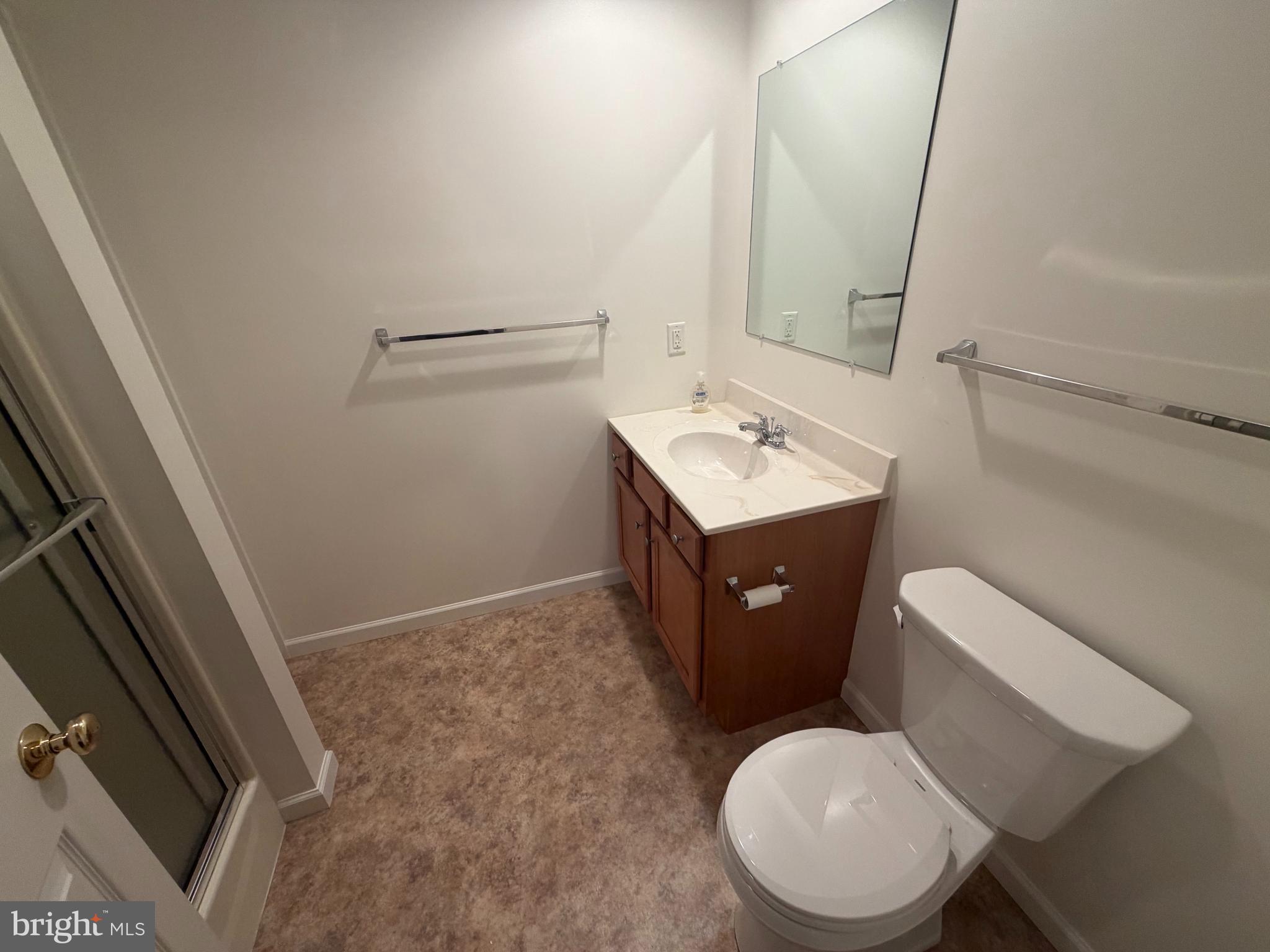 428 Haymarket Lane Lititz, PA 17543 - Photo 21 of 31 a bathroom with a toilet sink and mirror