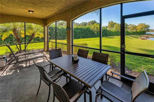 a view of a patio with a table chairs and a table