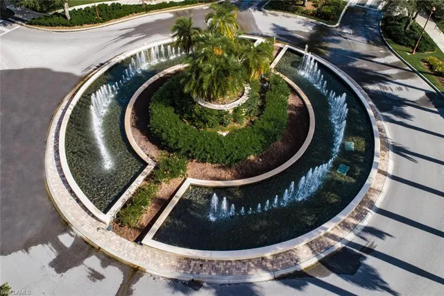 an aerial view of a house with outdoor space