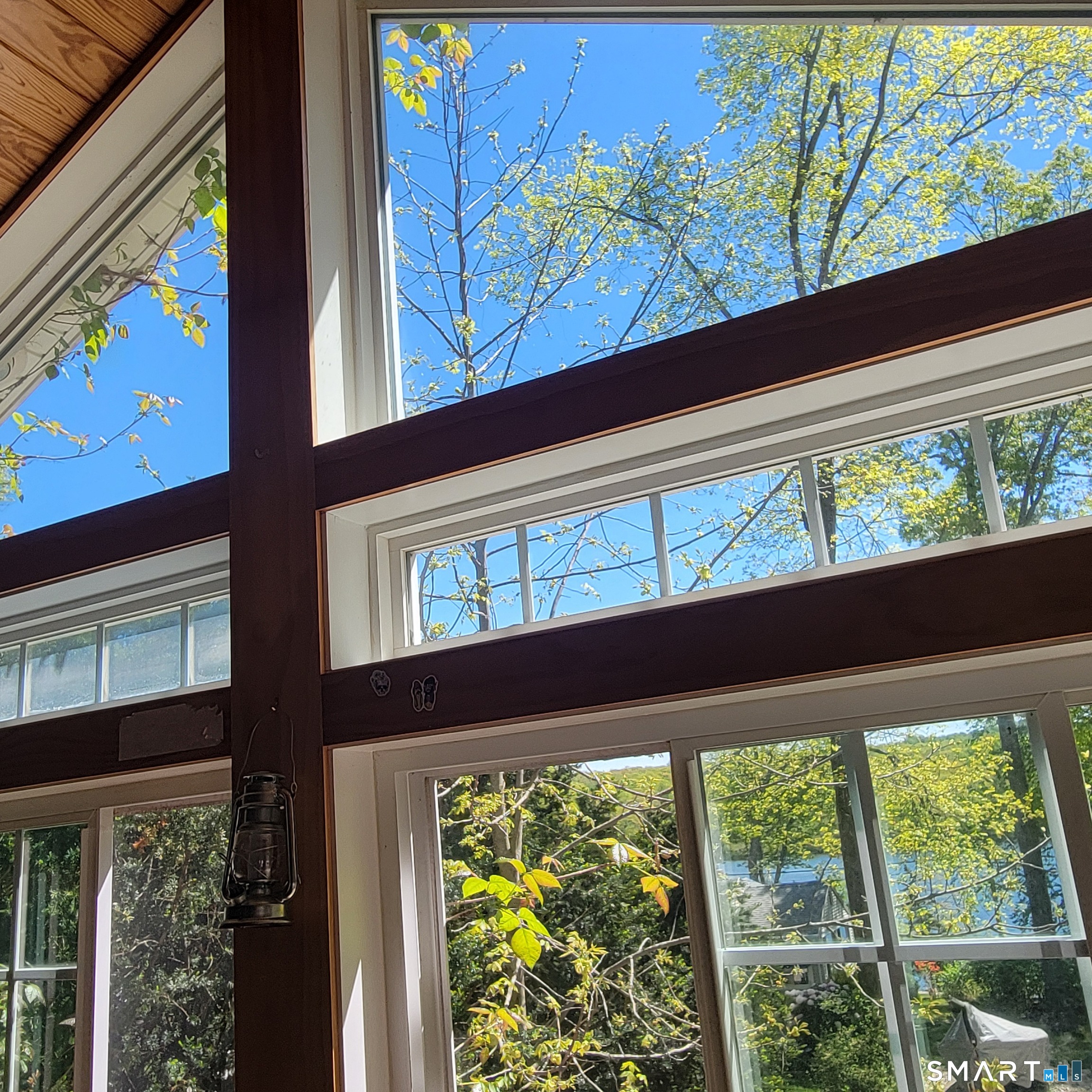 22 Ridgewood Road East Haddam, CT 06415 - Photo 12 of 28 Another view of the wall of glass windows that are featured in the great room
