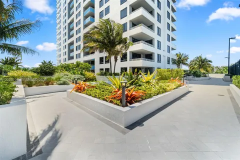 front view of a building with a yard