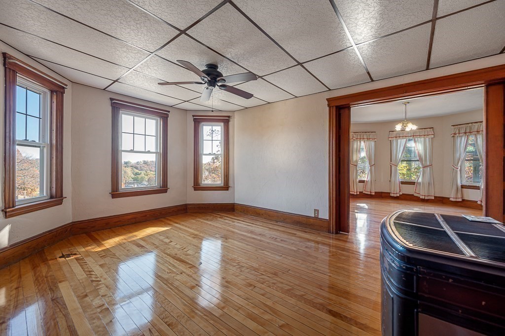 24 Second Street Worcester, MA 01602 - Photo 17 of 42 a view of an empty room with window and wooden floor