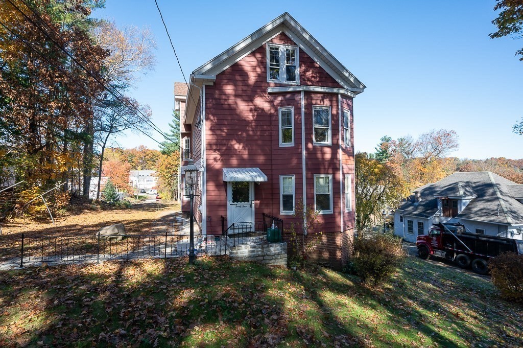 24 Second Street Worcester, MA 01602 - Photo 2 of 42 a view of a house with a yard
