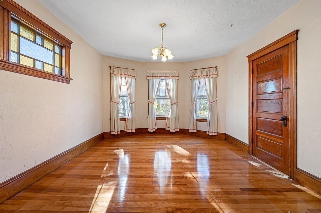 24 Second Street Worcester, MA 01602 - Photo 22 of 42 wooden floor in an empty room with a window