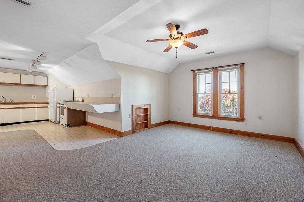 24 Second Street Worcester, MA 01602 - Photo 28 of 42 a view of a livingroom with a ceiling fan and window