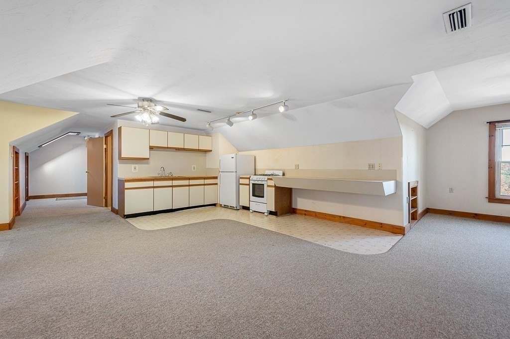 24 Second Street Worcester, MA 01602 - Photo 30 of 42 a view of a room with wooden floor closet and windows