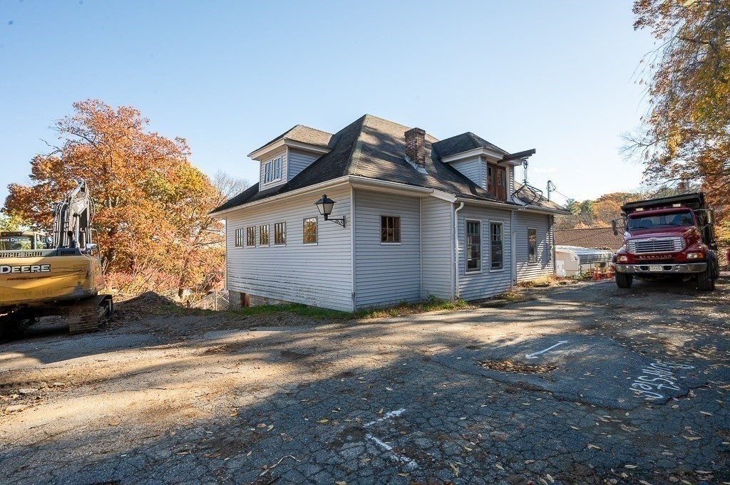 24 Second Street Worcester, MA 01602 - Photo 34 of 42 a view of a house with a yard covered in the roadside