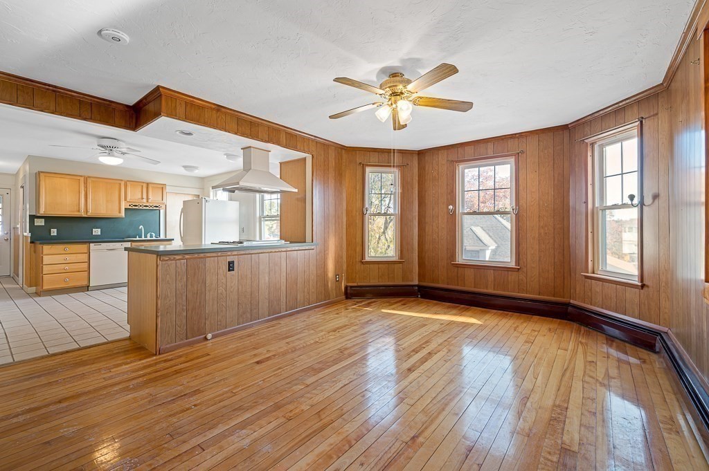 24 Second Street Worcester, MA 01602 - Photo 9 of 42 a view of an empty room with window and wooden floor