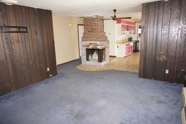 a view of a livingroom with a fireplace