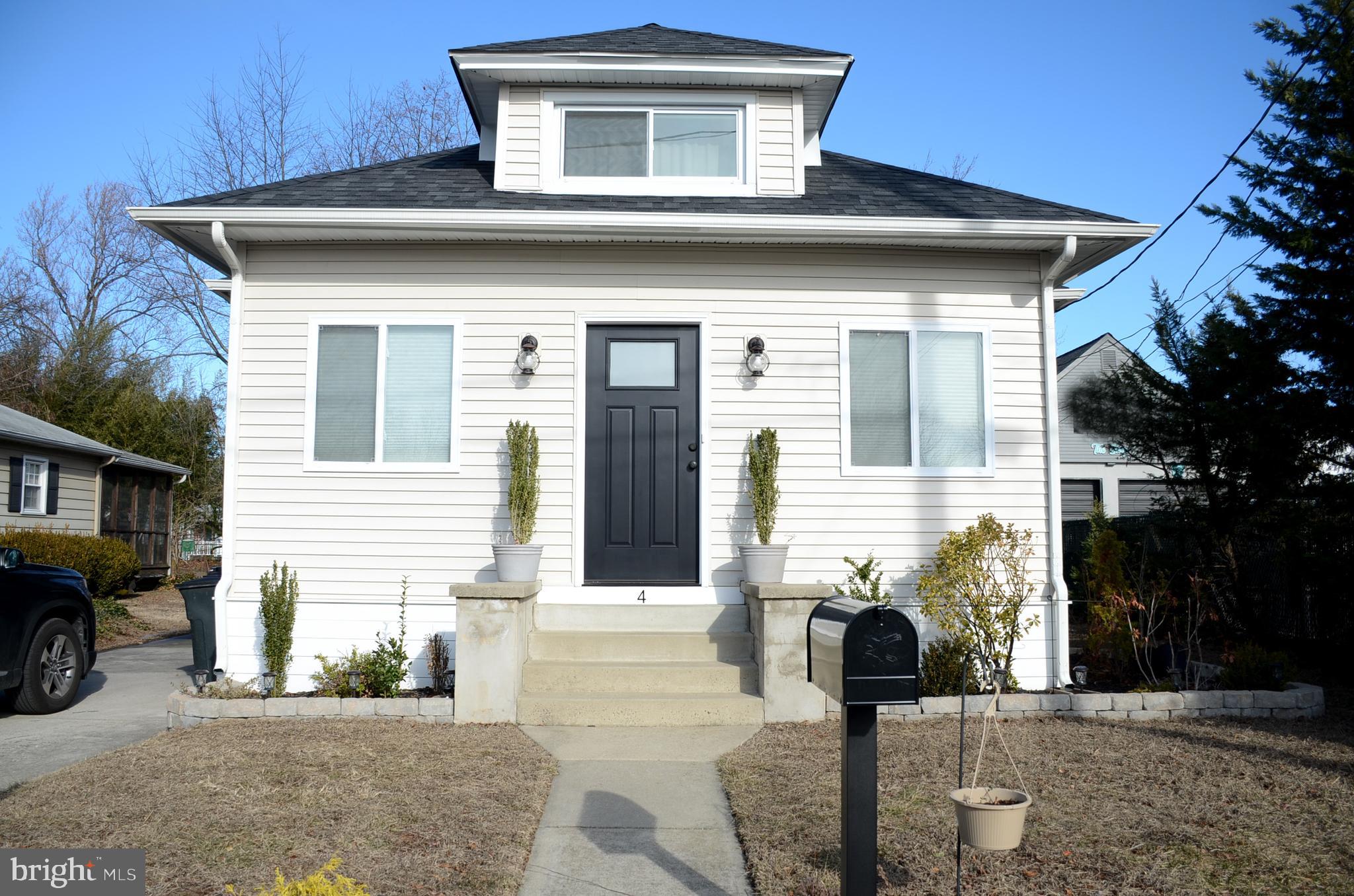 4 Norman Avenue Delran, NJ 08075 - Photo 1 of 30 a front view of a house with garden