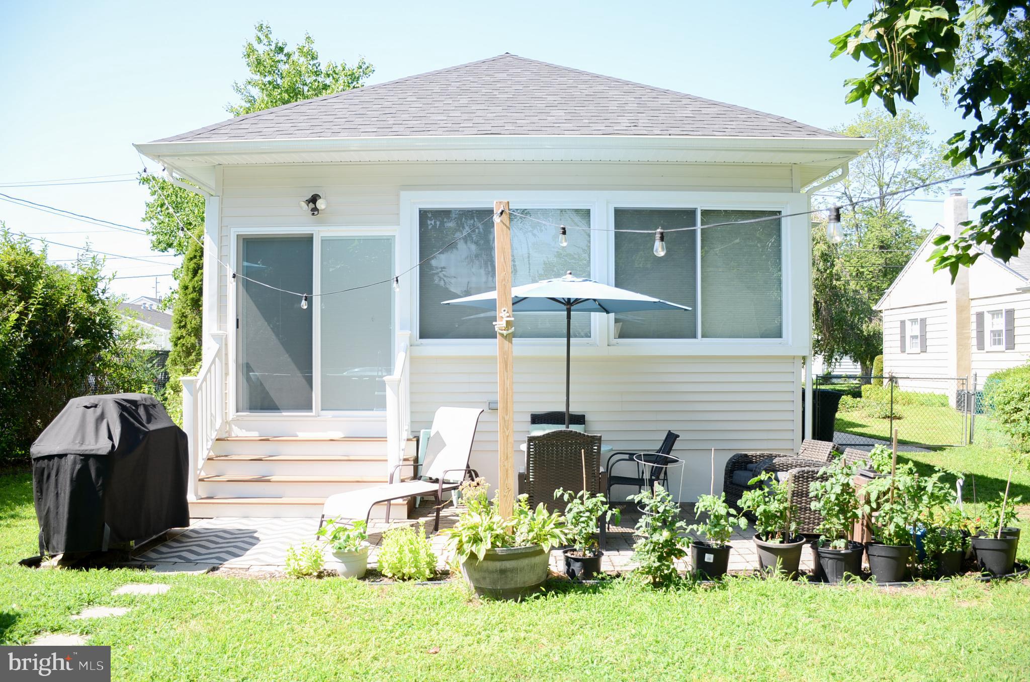 4 Norman Avenue Delran, NJ 08075 - Photo 30 of 30 a front view of a house with a garden
