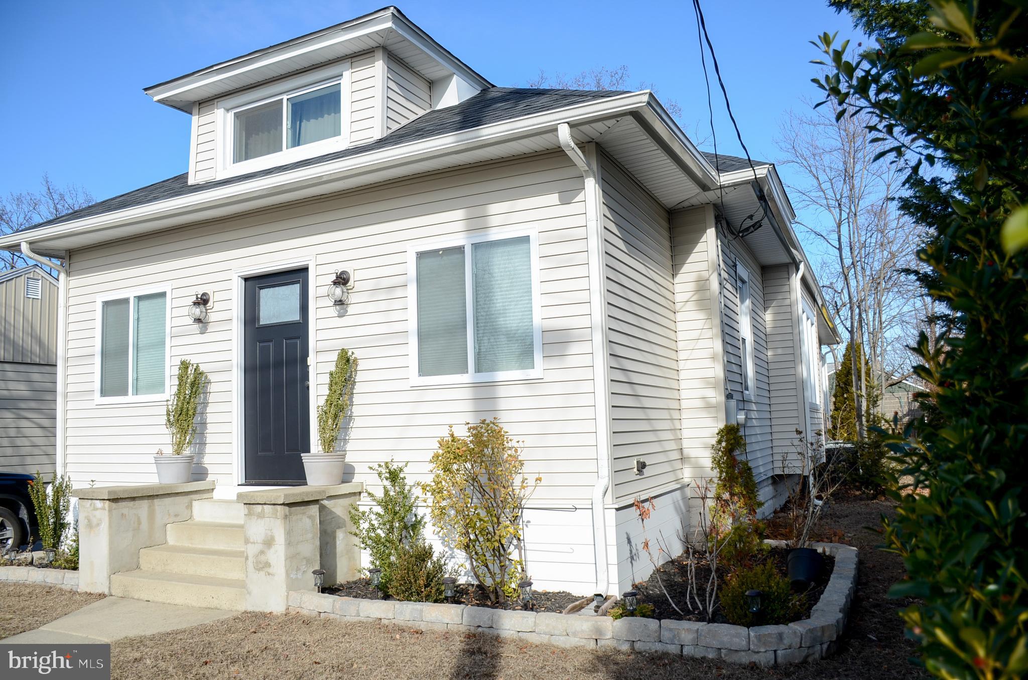 4 Norman Avenue Delran, NJ 08075 - Photo 3 of 30 a front view of a house with plants