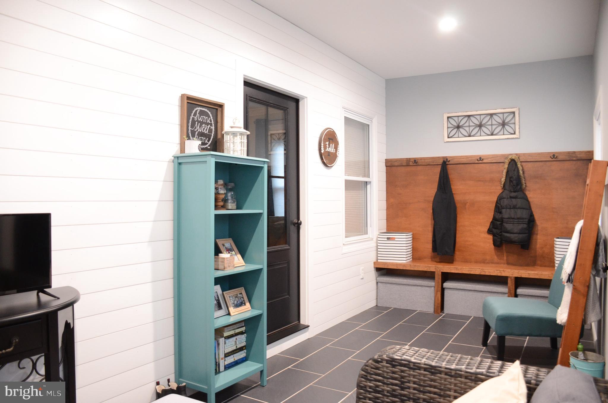 4 Norman Avenue Delran, NJ 08075 - Photo 5 of 30 a living room with furniture and a book shelf