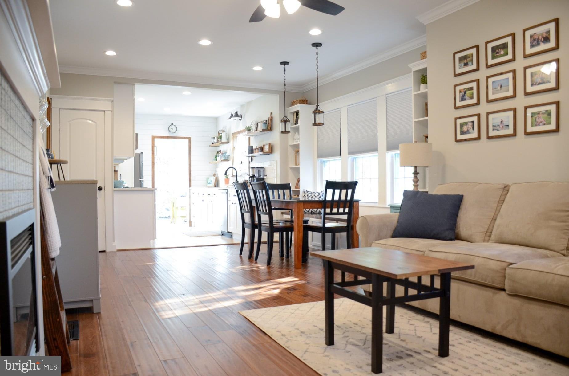 4 Norman Avenue Delran, NJ 08075 - Photo 8 of 30 a living room with furniture a dining table and kitchen view