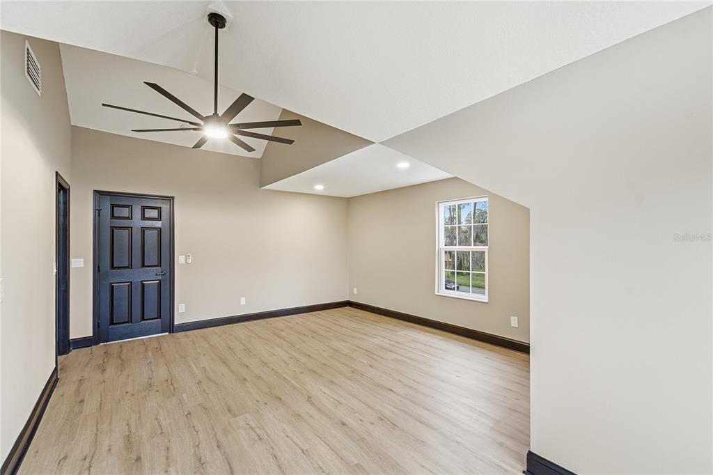 14728 Henson Road Orlando, FL 32832 - Photo 22 of 79 a view of an empty room with a window