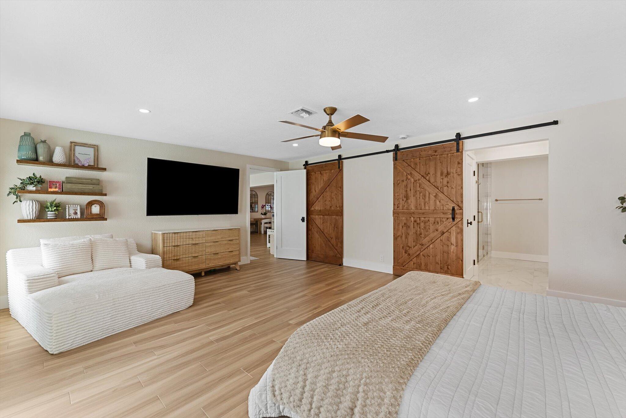 1289 Southwest 7th Street Boca Raton, FL 33486 - Photo 16 of 42 a living room with furniture and a flat screen tv