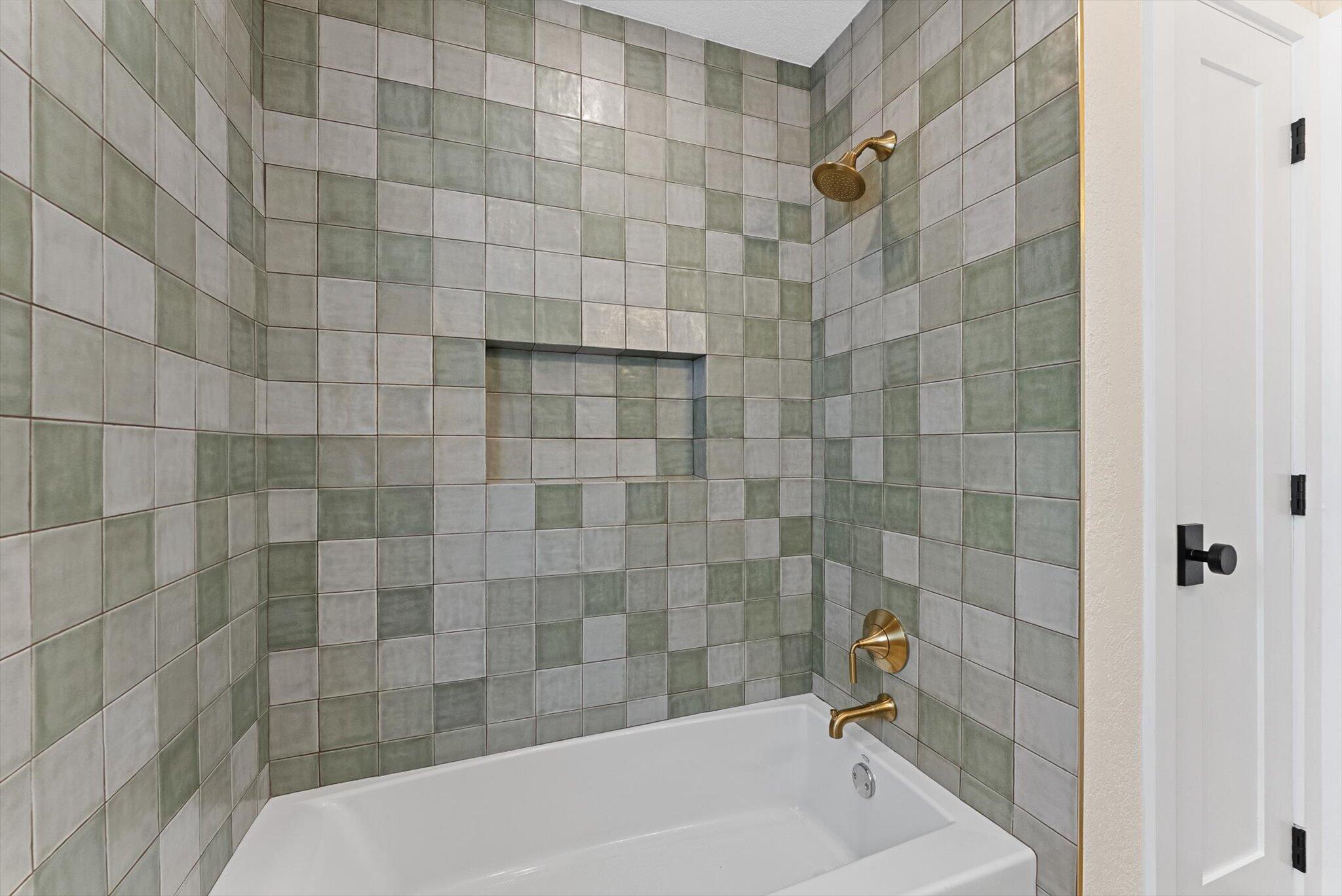 1289 Southwest 7th Street Boca Raton, FL 33486 - Photo 30 of 42 a bathroom with a bathtub