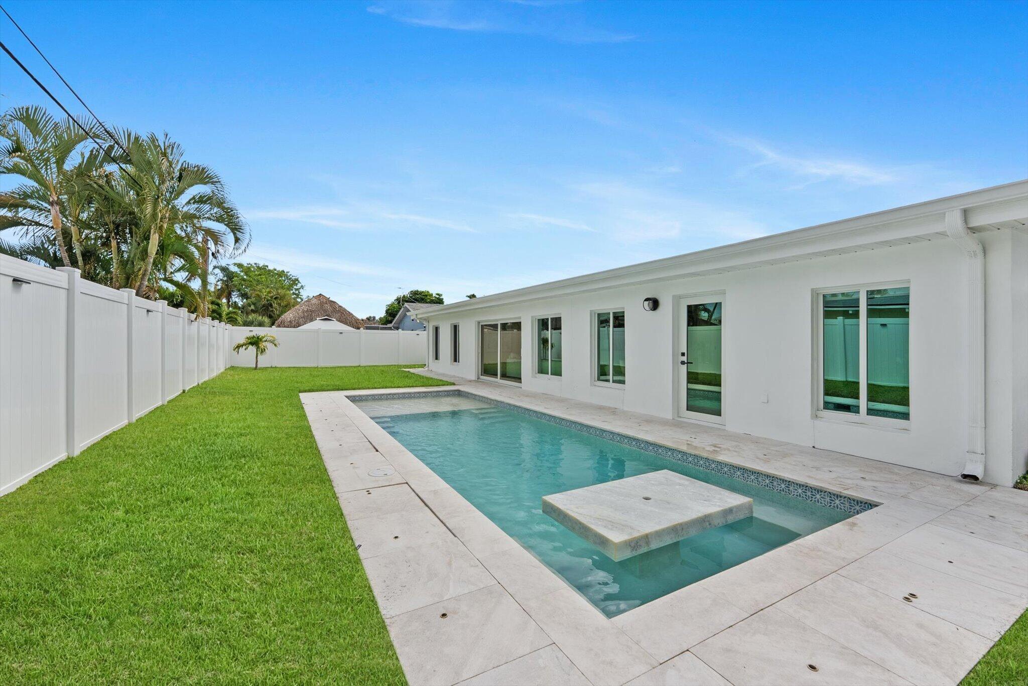 1289 Southwest 7th Street Boca Raton, FL 33486 - Photo 36 of 42 a view of house with yard
