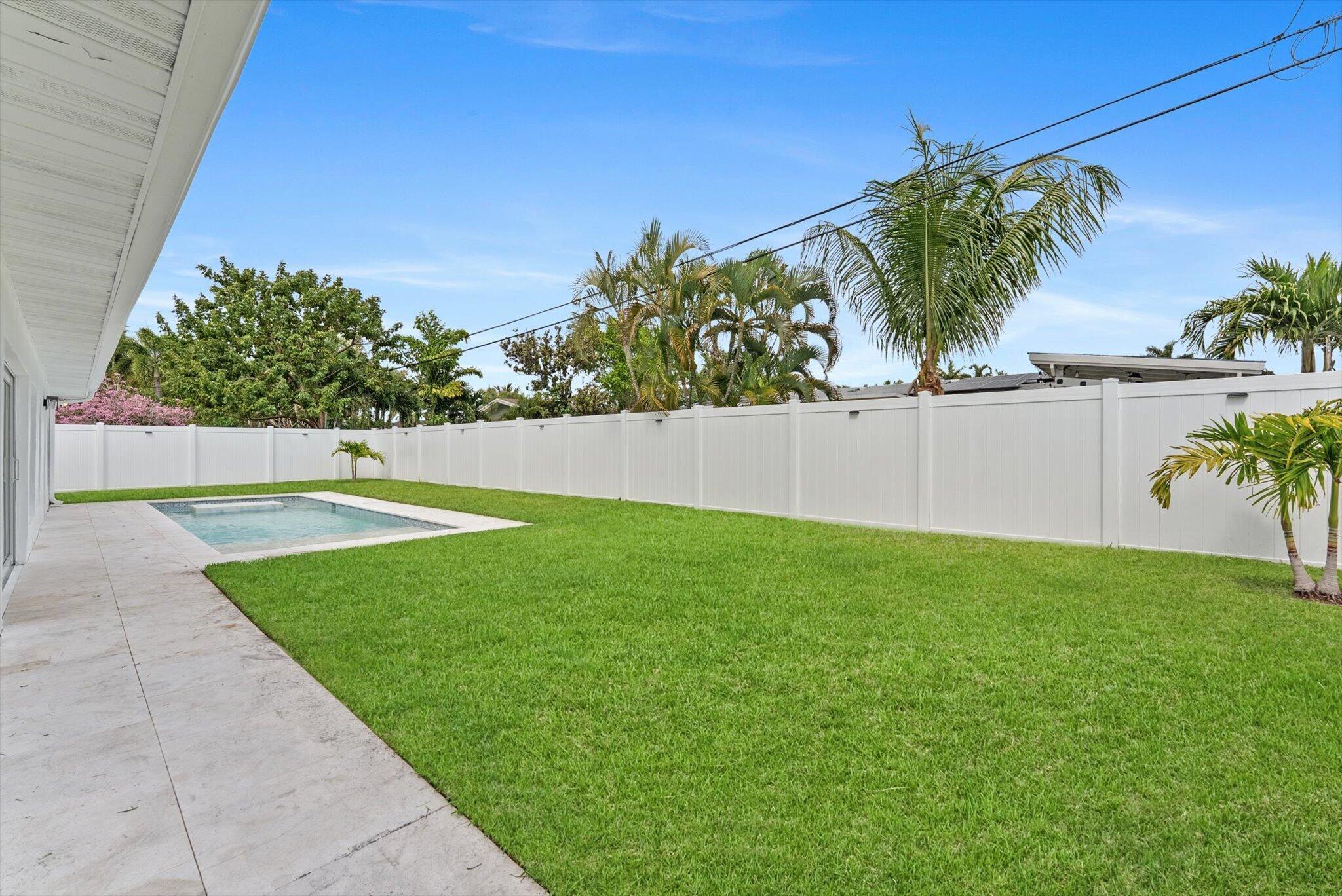 1289 Southwest 7th Street Boca Raton, FL 33486 - Photo 39 of 42 a view of green field with grass