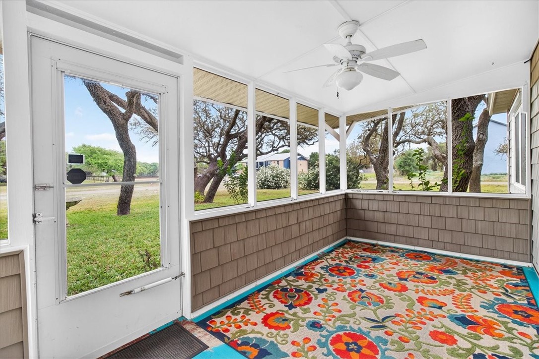 1521 South Mathis Street Rockport, TX 78382 - Photo 4 of 40 Screened in front porch.