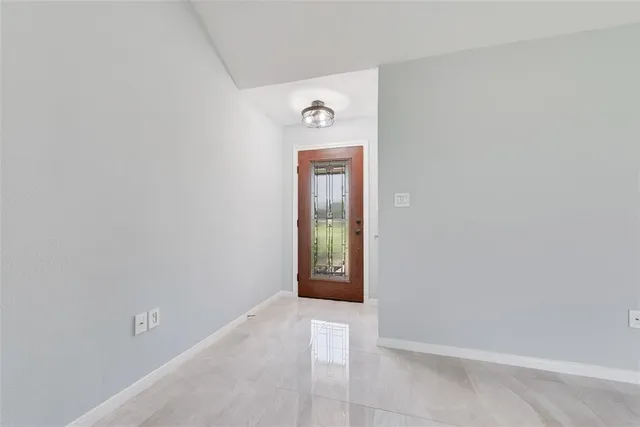 a view of a hallway with closet