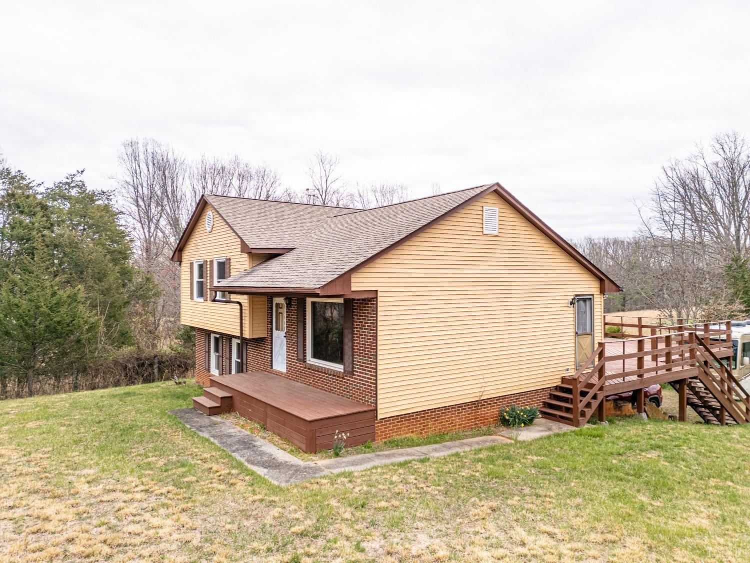 182 Buffalo Ridge Road Amherst, VA 24521 - Photo 35 of 57 a view of a house with a yard