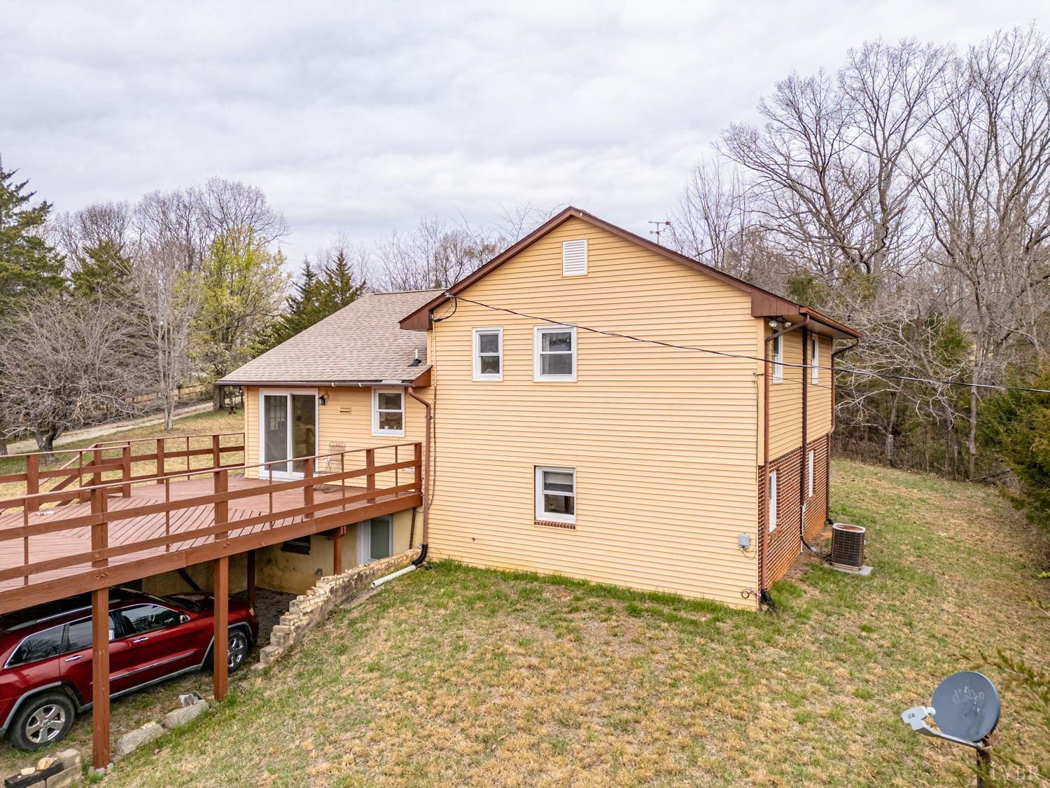 182 Buffalo Ridge Road Amherst, VA 24521 - Photo 39 of 57 a view of a house with a yard
