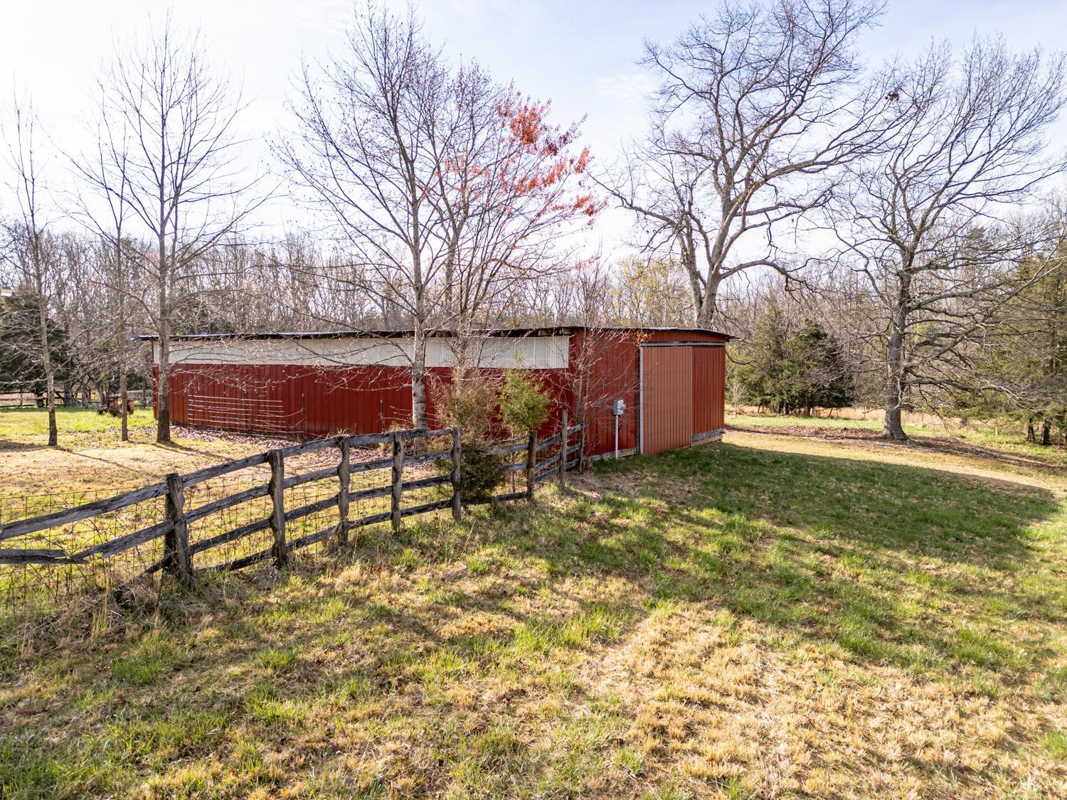 182 Buffalo Ridge Road Amherst, VA 24521 - Photo 4 of 57 a view of a yard with wooden fence