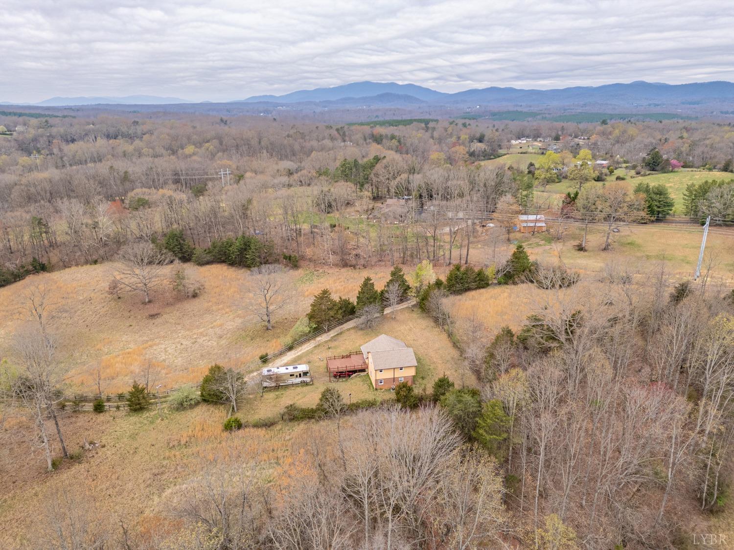 182 Buffalo Ridge Road Amherst, VA 24521 - Photo 42 of 57 an aerial view of mountain with wooden fence