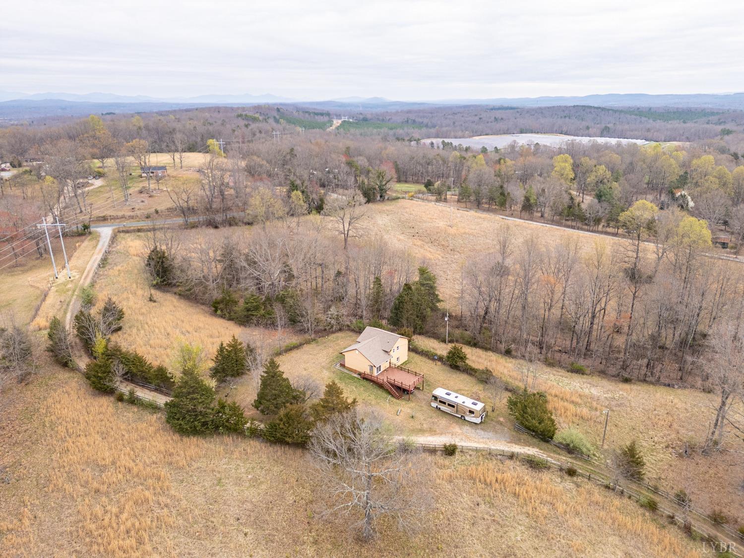 182 Buffalo Ridge Road Amherst, VA 24521 - Photo 45 of 57 an aerial view of a house with a yard