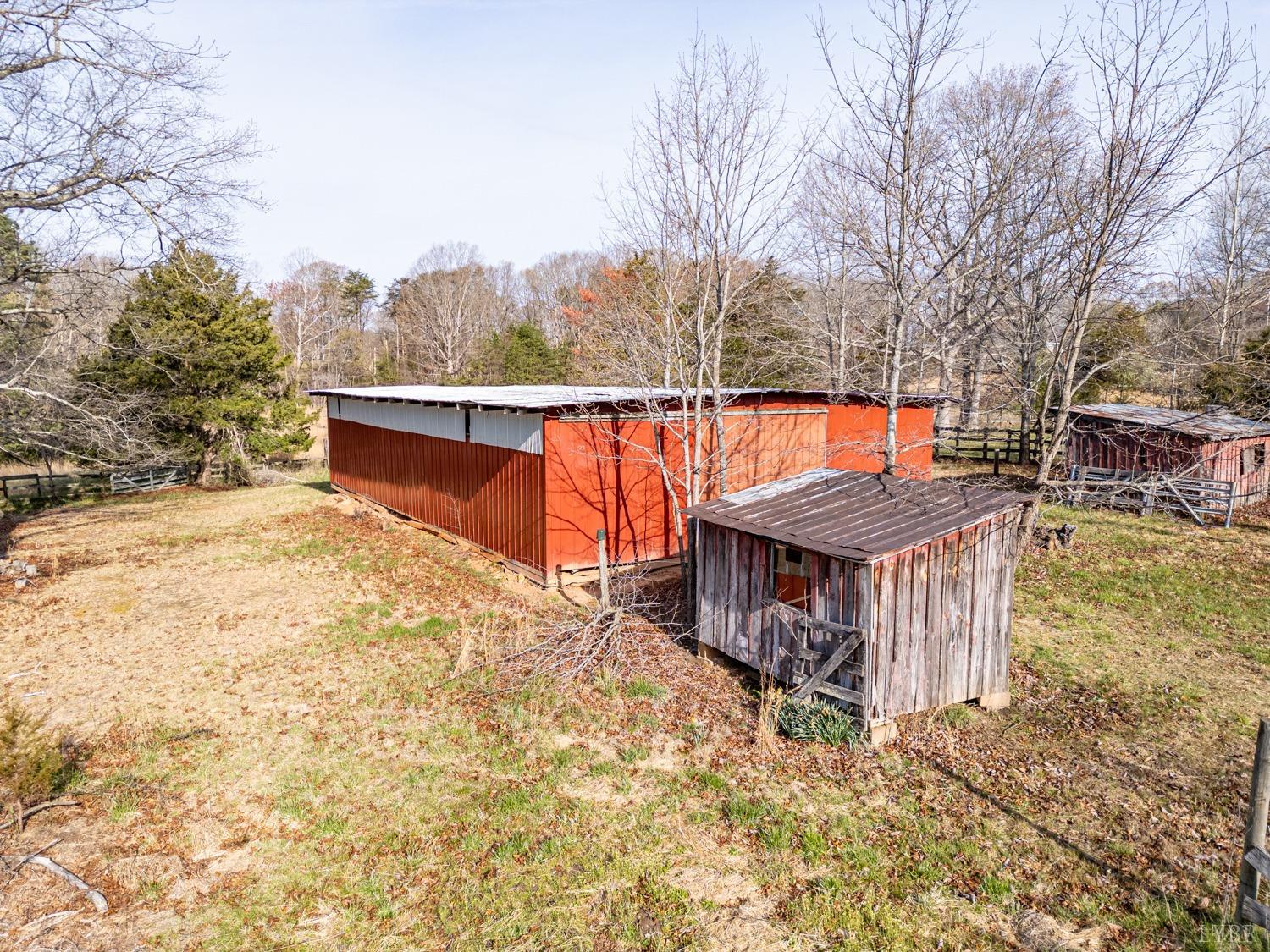 182 Buffalo Ridge Road Amherst, VA 24521 - Photo 48 of 57 a view of a wooden deck with large trees