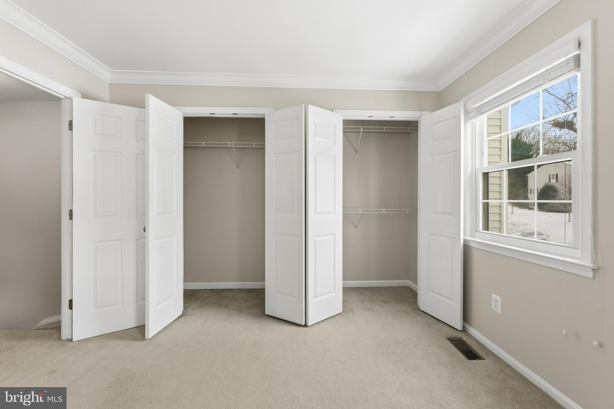 6036 Old Landing Way, Unit 29 Burke, VA 22015 - Photo 16 of 31 an empty room with windows