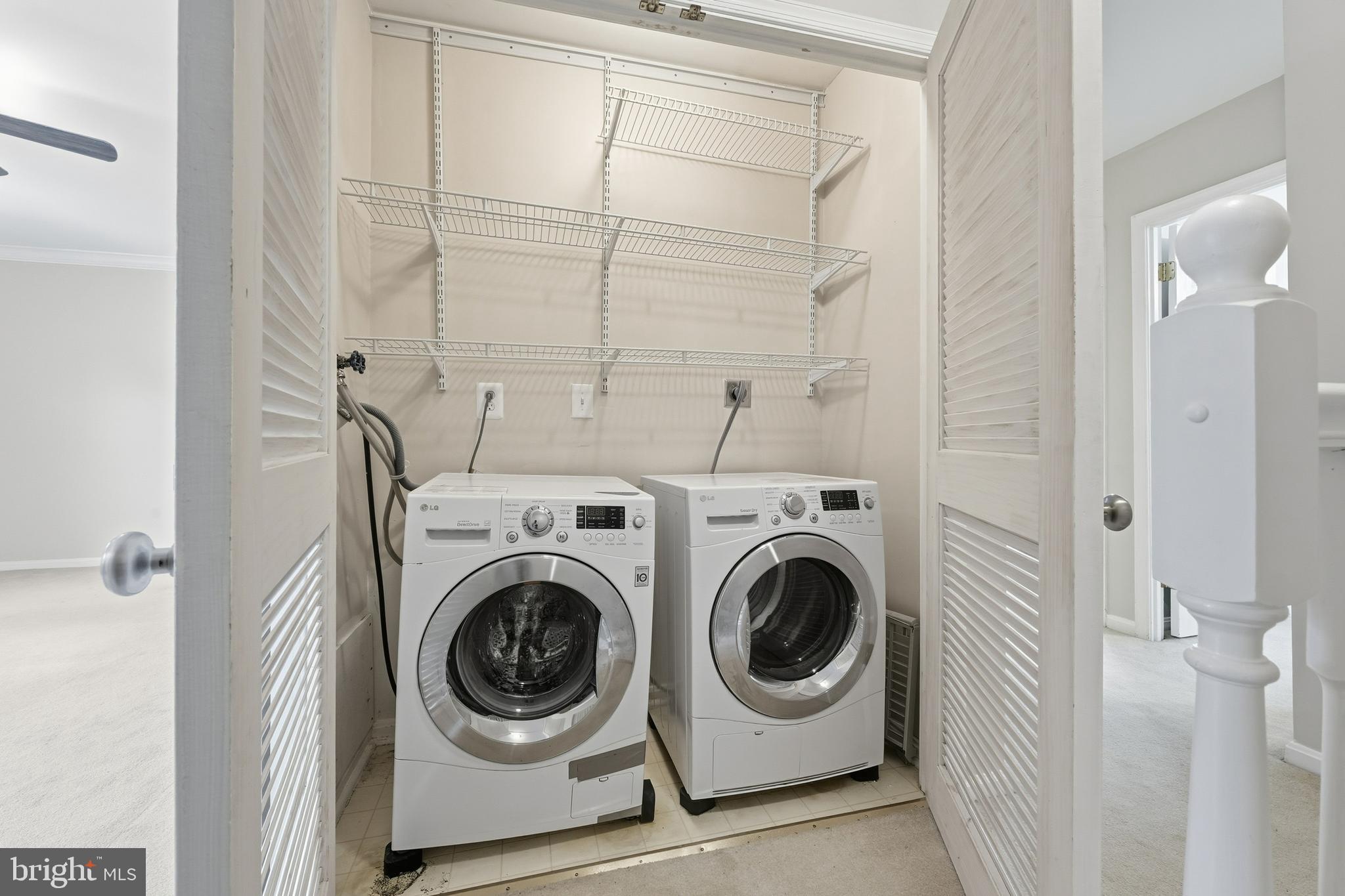 6036 Old Landing Way, Unit 29 Burke, VA 22015 - Photo 23 of 31 a utility room with dryer and washer