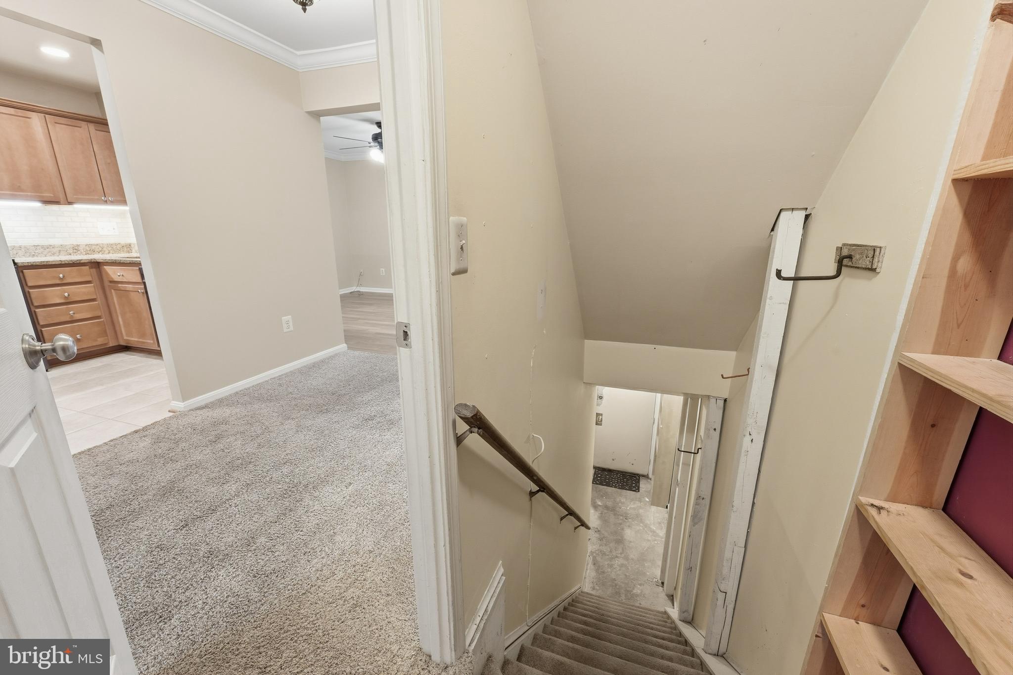 6036 Old Landing Way, Unit 29 Burke, VA 22015 - Photo 24 of 31 a view of a livingroom with wooden floor and staircase