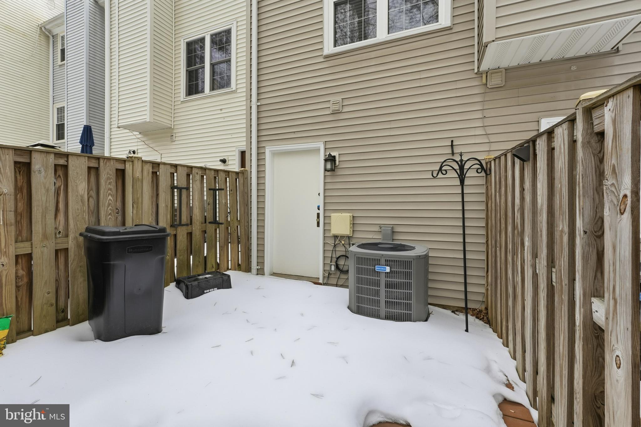 6036 Old Landing Way, Unit 29 Burke, VA 22015 - Photo 25 of 31 a view of a house with backyard and furniture
