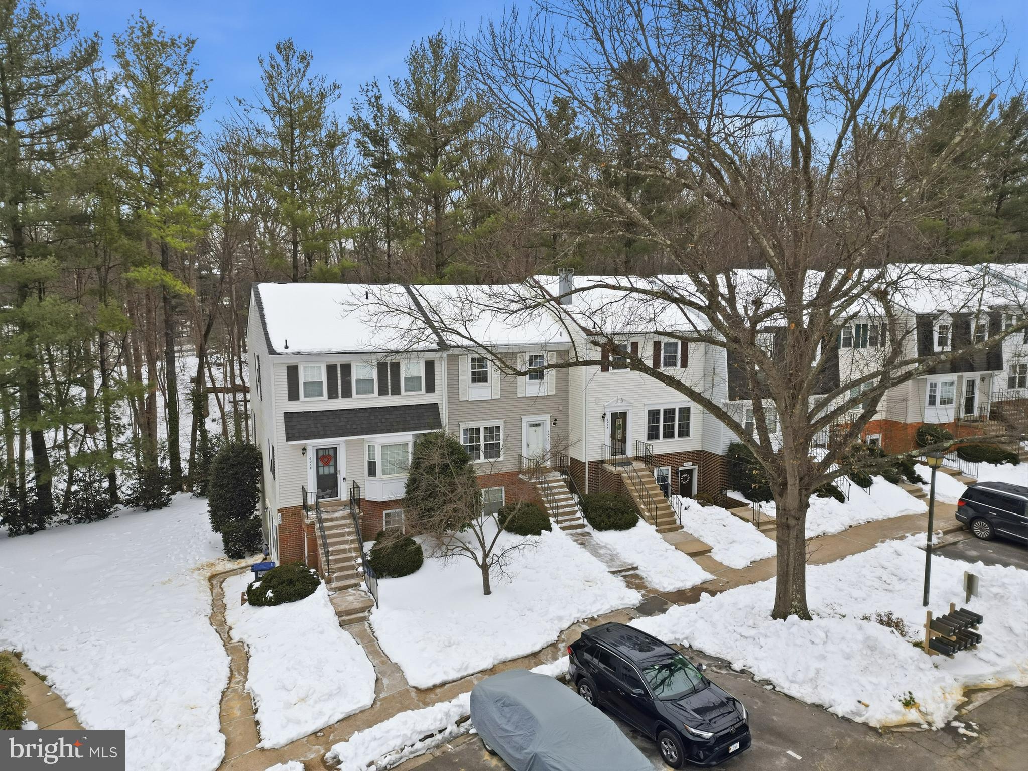 6036 Old Landing Way, Unit 29 Burke, VA 22015 - Photo 28 of 31 a view of a patio with a yard