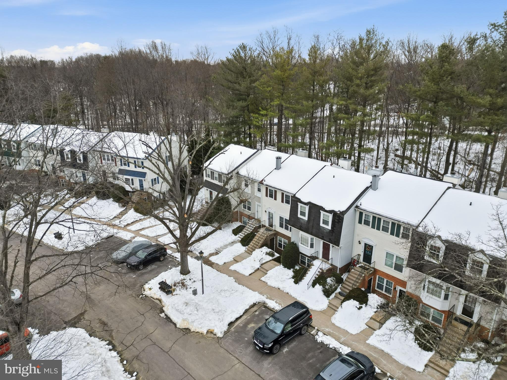6036 Old Landing Way, Unit 29 Burke, VA 22015 - Photo 29 of 31 a terrace with outdoor seating and trees