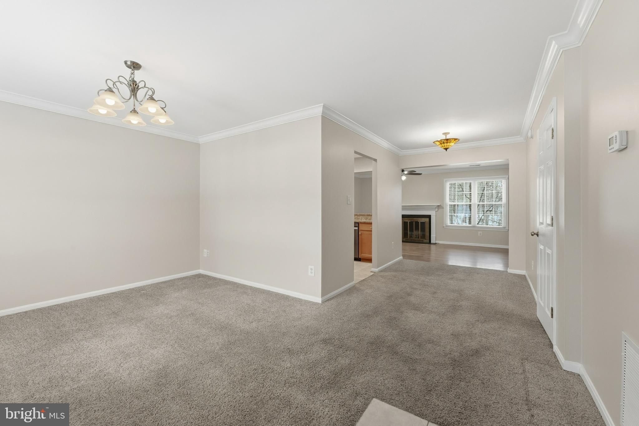 6036 Old Landing Way, Unit 29 Burke, VA 22015 - Photo 4 of 31 a view of an empty room with a window