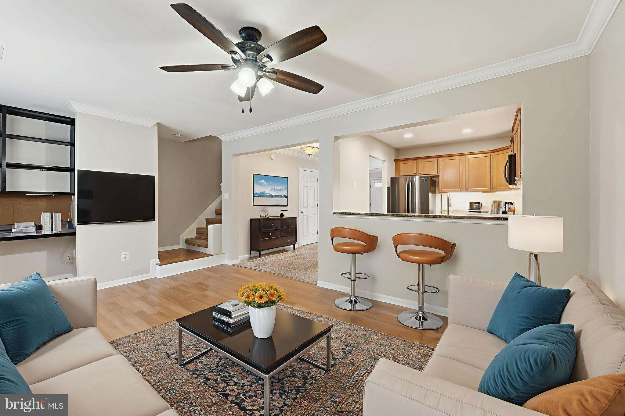 6036 Old Landing Way, Unit 29 Burke, VA 22015 - Photo 5 of 31 a living room with furniture and a view of kitchen