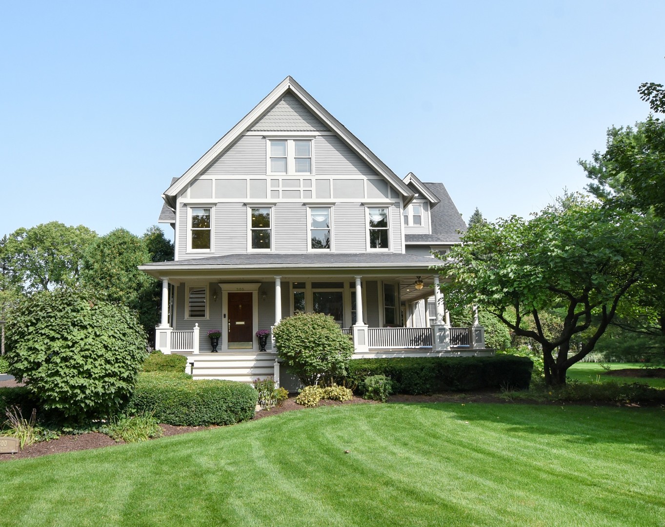 300 North Delaplaine Road Riverside, IL 60546 - Photo 1 of 50 a front view of a house with a yard