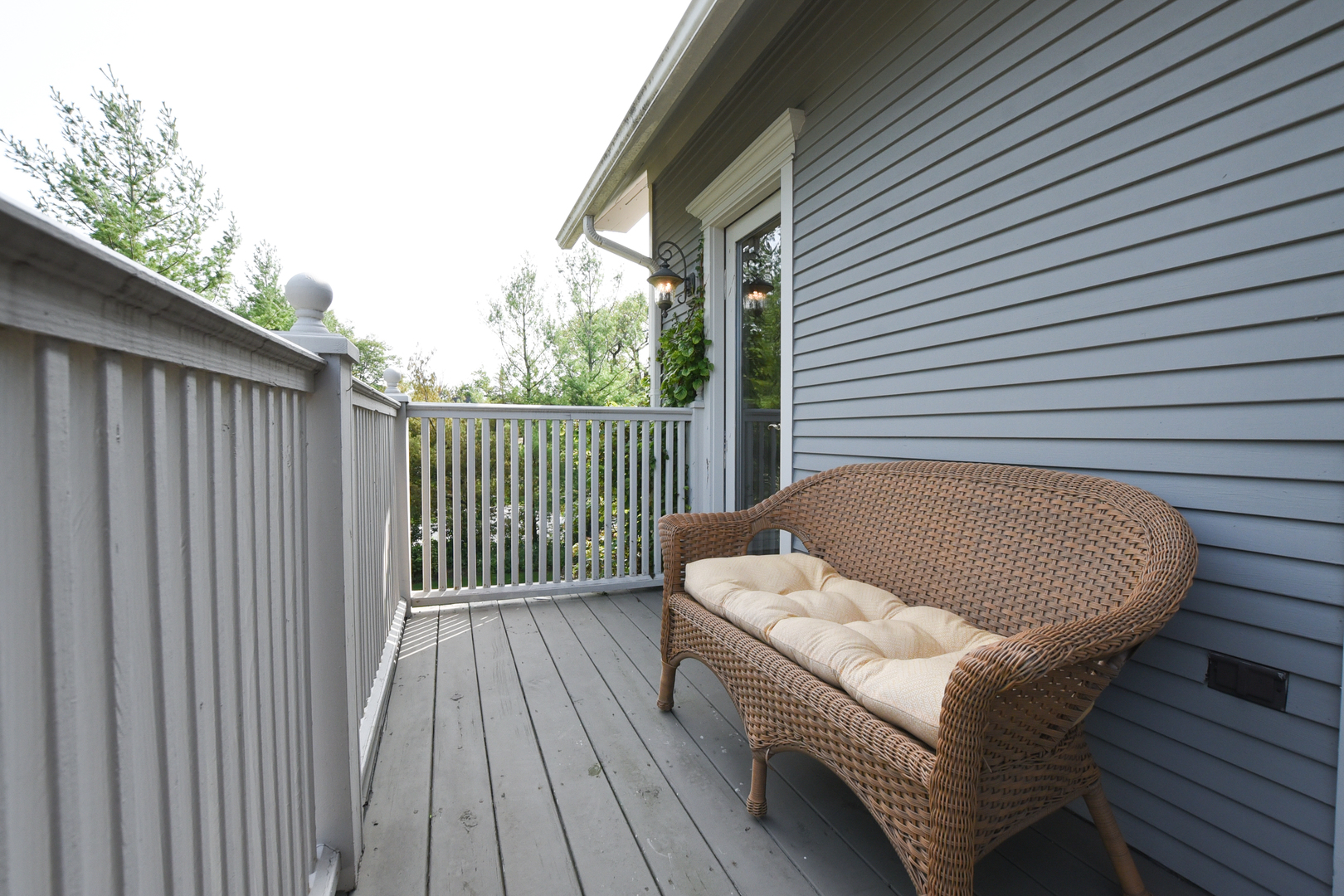 300 North Delaplaine Road Riverside, IL 60546 - Photo 28 of 50 a view of a chair in the deck