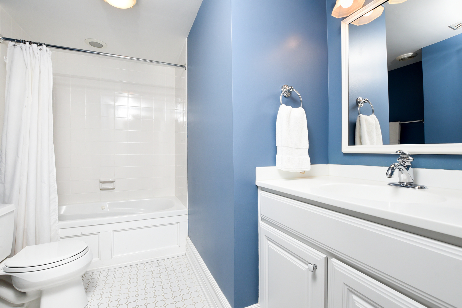 300 North Delaplaine Road Riverside, IL 60546 - Photo 35 of 50 a bathroom with a sink a toilet and shower